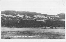 SA1623 - Distant view of the New Lebanon, NY Shaker village and Taconic Mountains. Identified on the front., Winterthur Shaker Photograph and Post Card Collection 1851 to 1921c